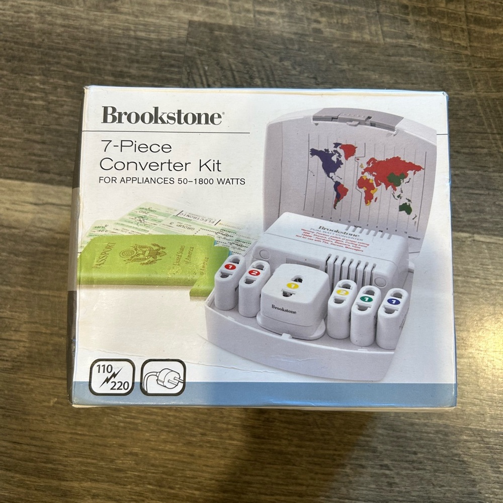 Brookstone Universal Adapter Set with White and Black Accents